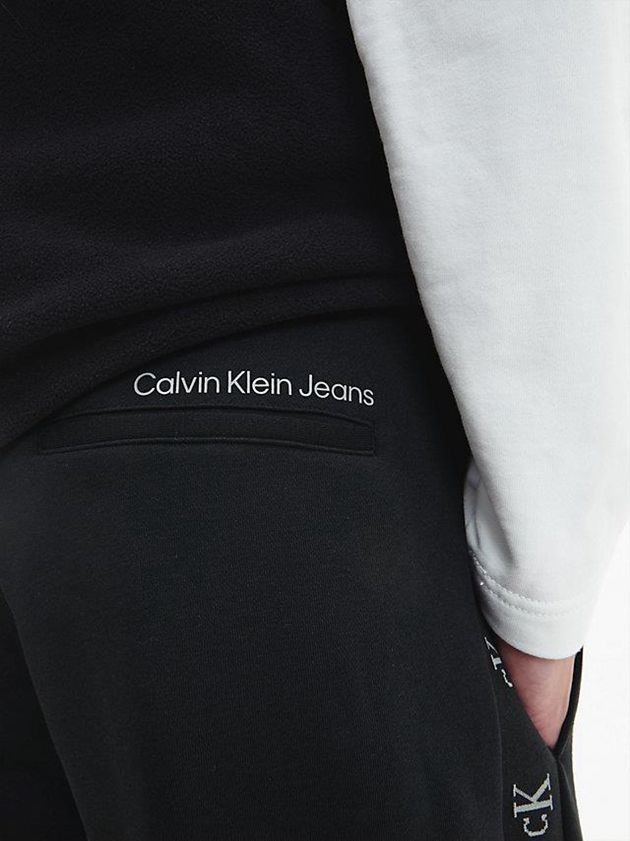 Black Calvin Klein Logo Tape Men Joggers | DYOZ-96087
