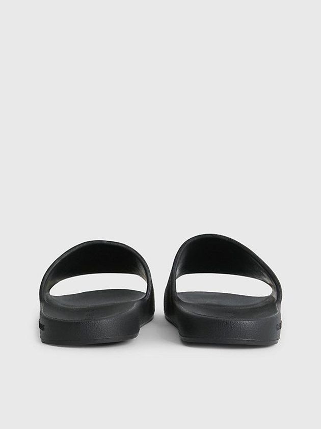 Black Calvin Klein Textured Sliders Men Slippers | HVOF-60472