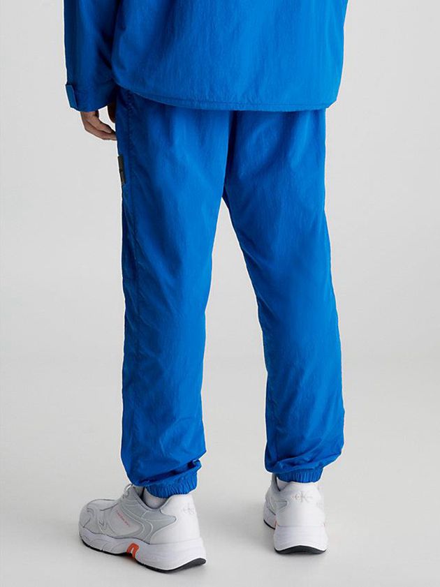 Blue Calvin Klein Recycled Nylon Tapered Men Pants | GQTJ-35907