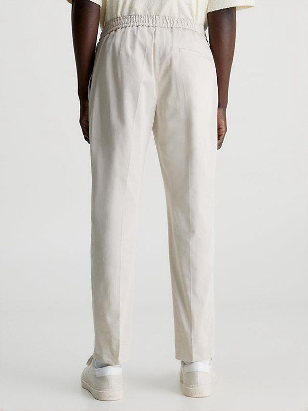 White Calvin Klein Slim Sateen Stretch Men Joggers | OMEX-17230